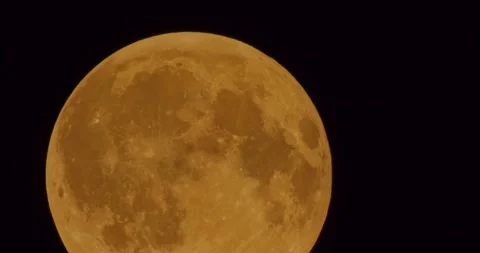 The moon after a total eclipse in a very strong close-up Stock Footage 316696941