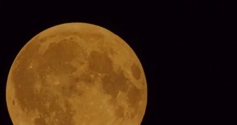 The moon after a total eclipse in a very strong close-up Stock Footage 316696948
