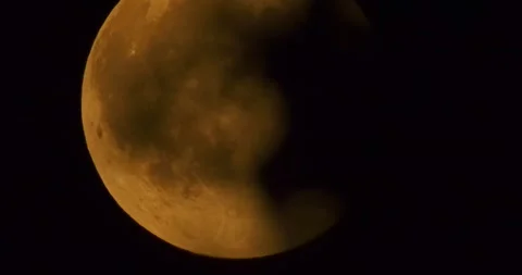 The moon after a total eclipse in a very strong close-up Stock Footage 316696950