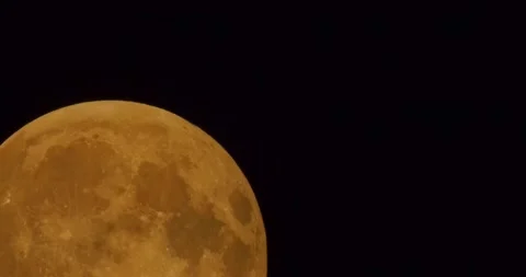 The moon after a total eclipse in a very strong close-up Stock Footage 316697584