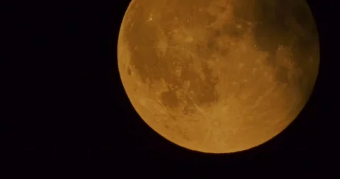 The moon after a total eclipse in a very strong close-up Stock Footage 316697896
