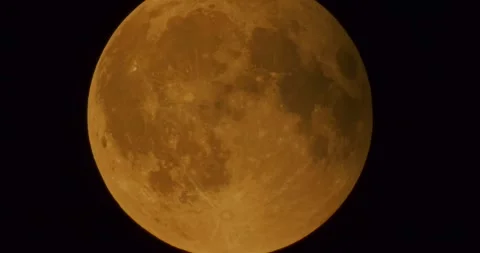 The moon after a total eclipse in a very strong close-up Stock Footage 316698137