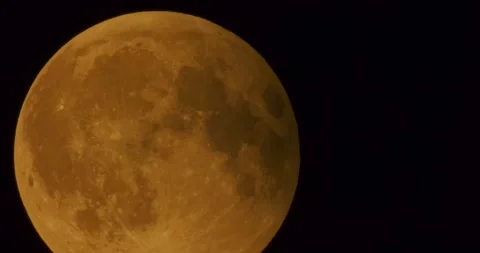 The moon after a total eclipse in a very strong close-up Stock Footage 316698179