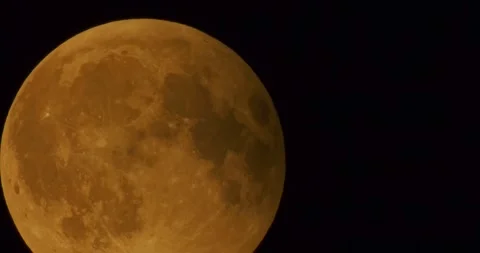 The moon after a total eclipse in a very strong close-up Stock Footage 316698216