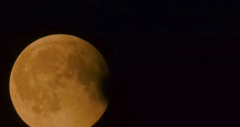 The moon after a total eclipse in a very strong close-up Stock Footage 316698652