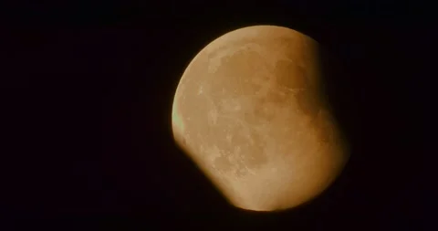The moon after a total eclipse in a very strong close-up Stock Footage 316698712