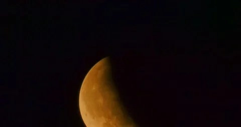 The moon after a total eclipse in a very strong close-up Stock Footage 316698920