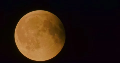 The moon after a total eclipse in a very strong close-up Stock Footage 316698963