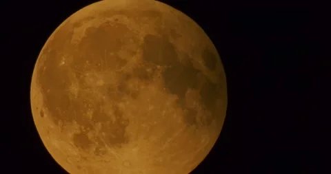 The moon after a total eclipse in a very strong close-up Stock Footage 316699210