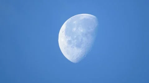 Moon against the blue sky Stock Footage 49486907