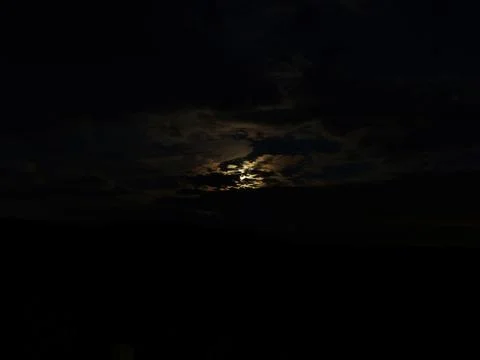 Moon Amongst the Clouds Stock Photos