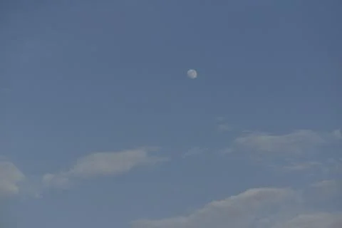 Moon and cloud on blue sky. Stock Photos