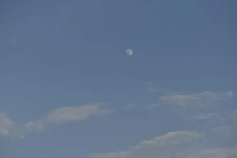 Moon and cloud on blue sky. Stock Photos