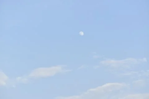 Moon and cloud on blue sky. Stock Photos