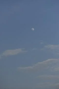 Moon and cloud on blue sky. Stock Photos