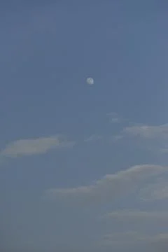 Moon and cloud on blue sky. Stock Photos