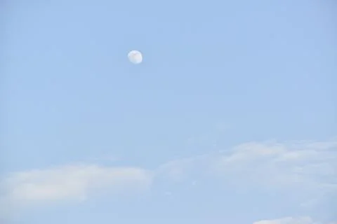 Moon and cloud on blue sky. Stock Photos
