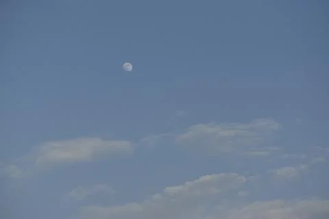 Moon and cloud on blue sky. Stock Photos