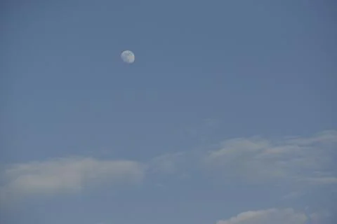 Moon and cloud on blue sky. Stock Photos