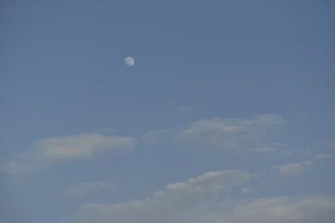 Moon and cloud on blue sky. Stock Photos