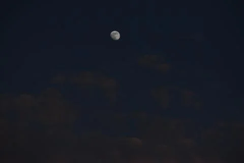 Moon and cloud on blue sky. Stock Photos