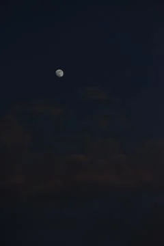 Moon and cloud on blue sky. Stock Photos