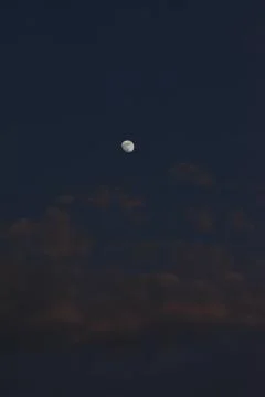 Moon and cloud on blue sky. Stock Photos