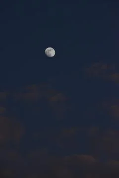 Moon and cloud on blue sky. Stock Photos