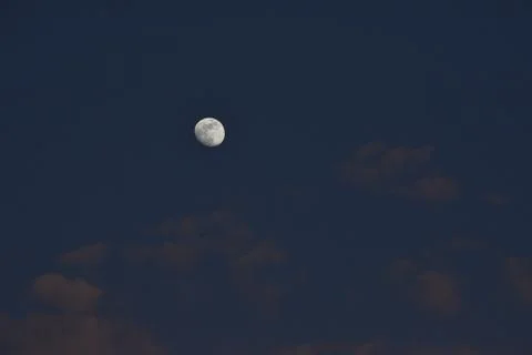 Moon and cloud on blue sky. Stock Photos