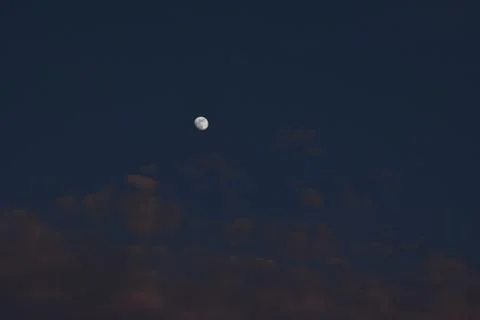 Moon and cloud on blue sky. Stock Photos