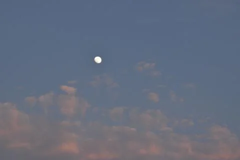 Moon and cloud on blue sky. Stock Photos