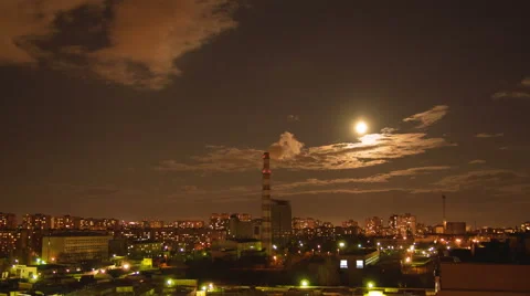 The moon and clouds above night city. Fast time lapse Stock Footage 48950295