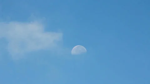 Moon and Clouds in the daytime Stock Footage 39648424