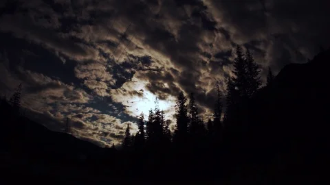 Moon and clouds night timelapse Stock Footage