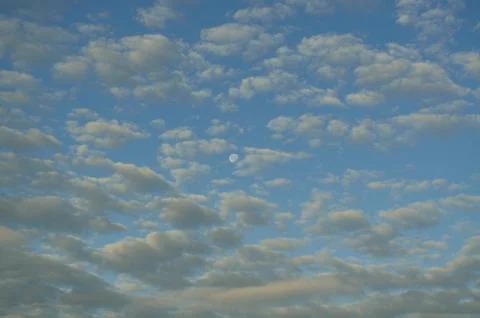 Moon and clouds Stock Photos