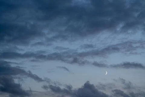 Moon and clouds Stock Photos