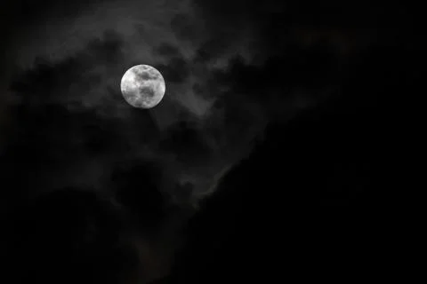 Moon and clouds in the sky. Stock Photos