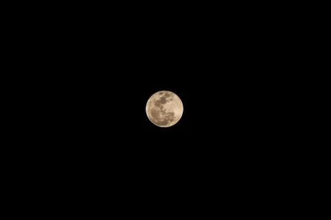 Moon and clouds in the sky. Stock Photos