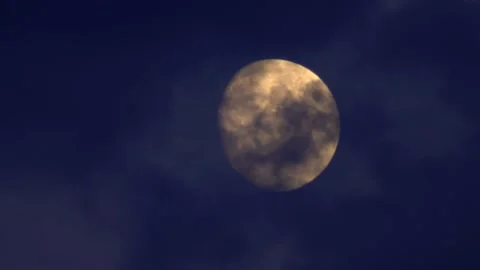 Moon and clouds at sunset Stock Footage 136648328