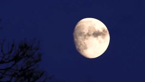 Moon and clouds at sunset Stock Footage 136648372