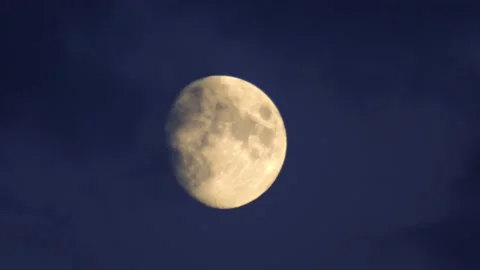 Moon and clouds at sunset Stock Footage 136648741