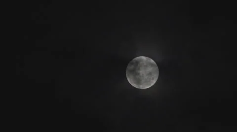 Moon and eerie fast moving night clouds Stock Footage 44079760