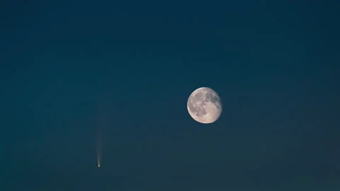 The  moon and flighting comet on the evening starry sky background Stock Footage 136135115