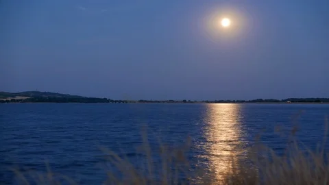 Moon and moonlight timelapse with mirror on lake Stock Footage 88109789