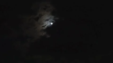 The Moon and moving clouds Stock Footage 220329232