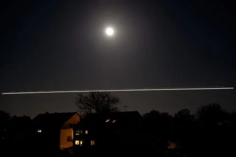 Moon and plane Stock Photos