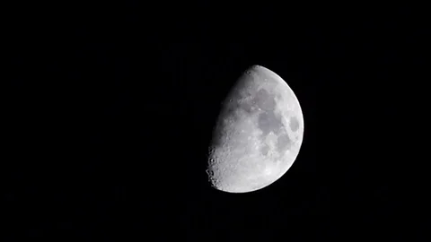 The moon and the rays emitted in the sky, the night half moon, Stock Footage