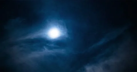 Moon and starlight illuminate layers of wispy cirrus clouds at twilight. Stock Footage 196636249