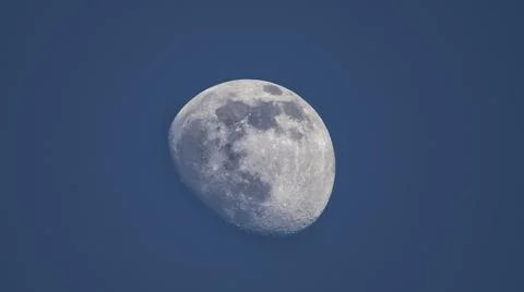 Moon on a background of blue sky. Fotos Stock
