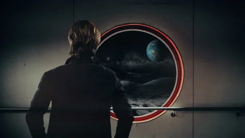 Moon Base Man Looking Through Window Looking at Planet Earth Stock Footage 164318733